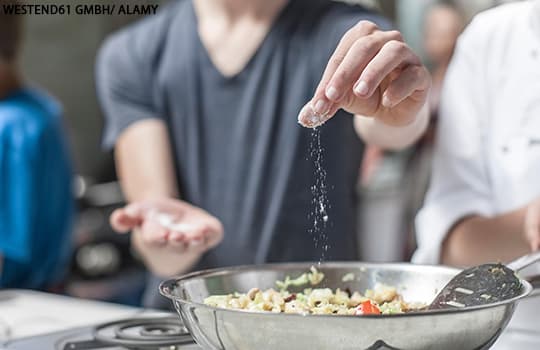 Salt being added to a dish