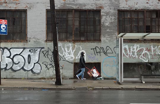 Man walking along street during the covid-19 pandemic