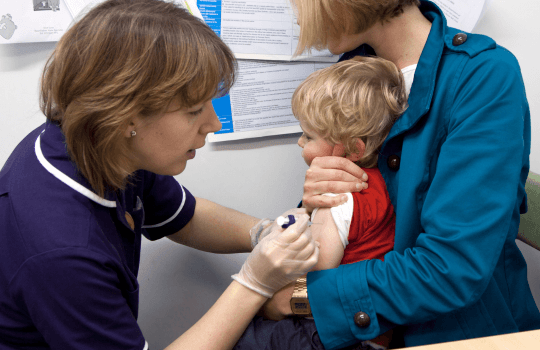 Child having vaccination