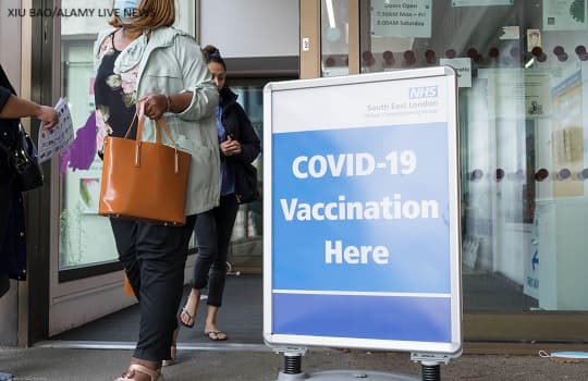 A sign for the covid vaccine