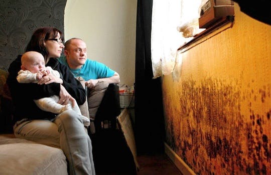 A family in a mouldy home
