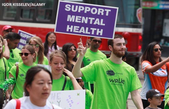 People participating in a walk in Toronto to raise awareness for those affected by psychotic illnesses